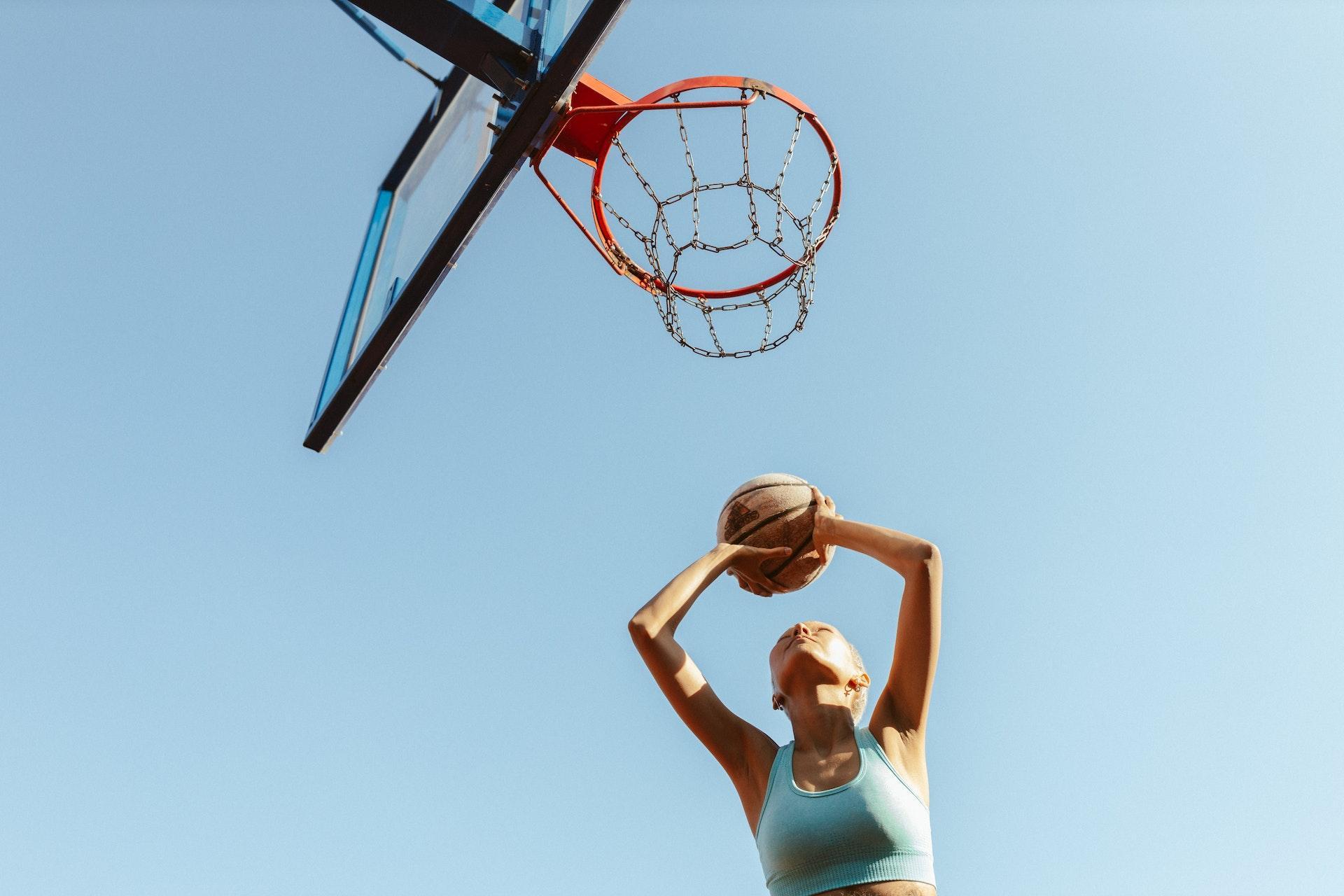 A Woman Playing Basketball